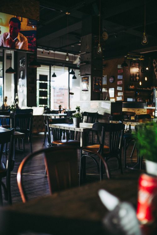 Free Warm and inviting restaurant interior showcasing modern decor and ambient lighting. Stock Photo