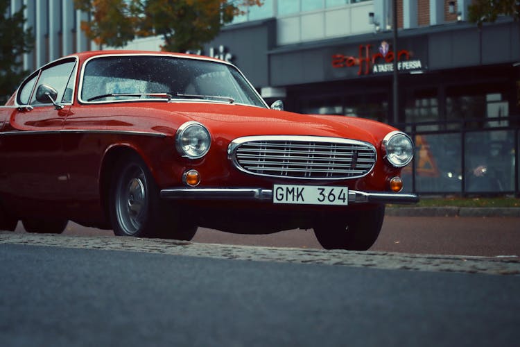 Vintage Red Car On Street