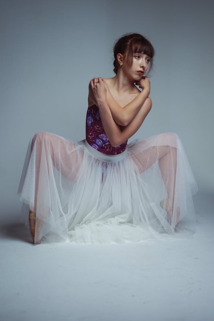 Ballerina Wearing A Tulle Dress Posing