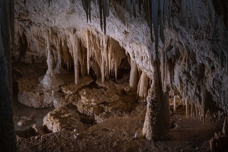 Stalactites And Stalagmites Inside A Cave