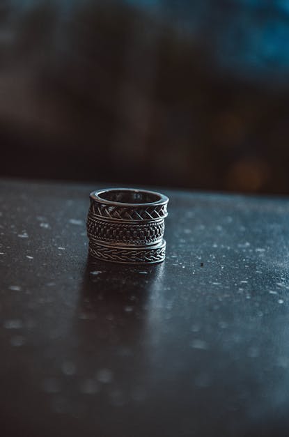 Three Silver-colored Rings on Black Surface · Free Stock Photo