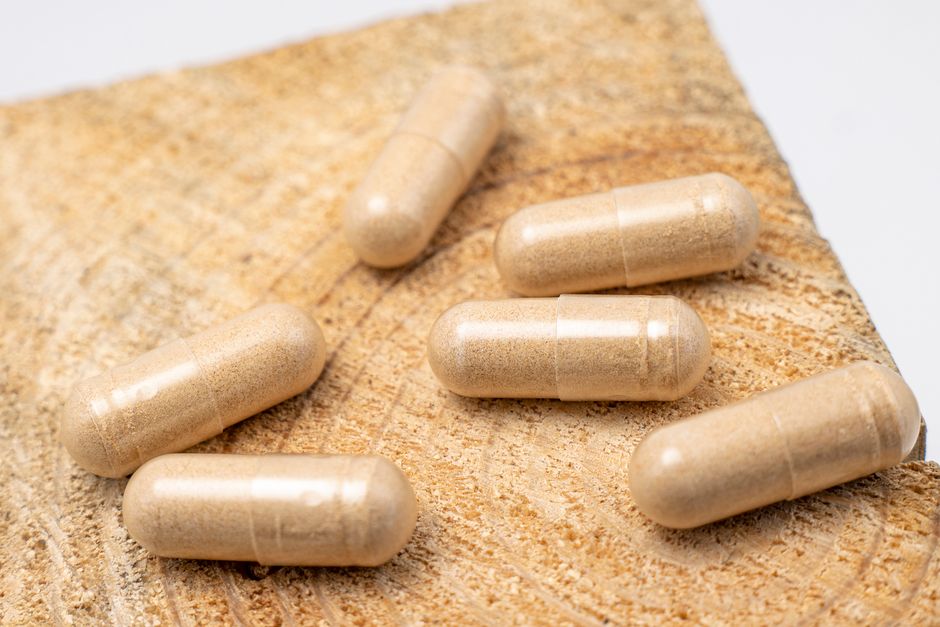 herbal supplements on wood table herbal supplements on wood table