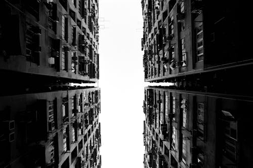 Grayscale Photo of High Rise Buildings