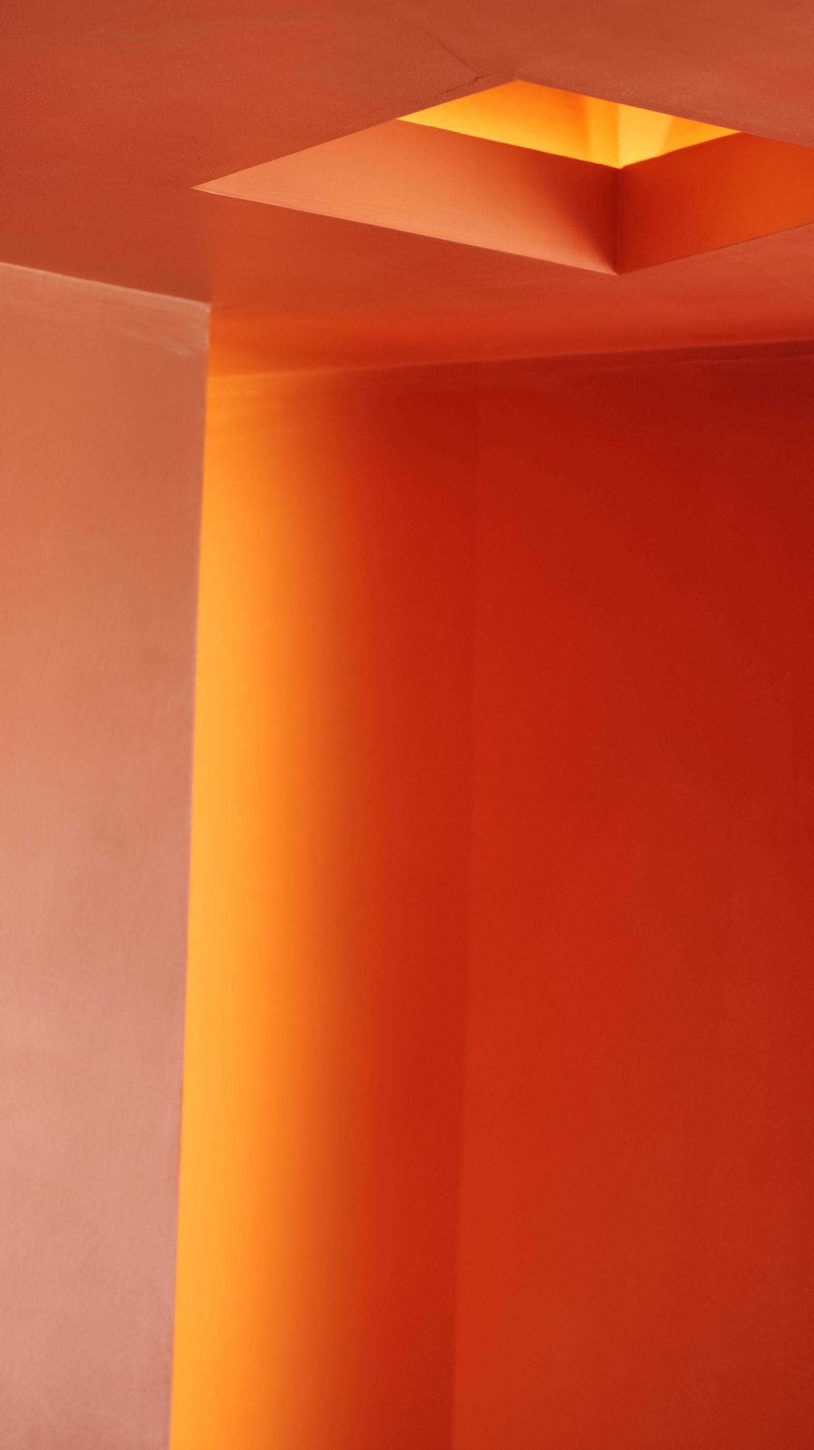 Orange architectural interior with geometric light
