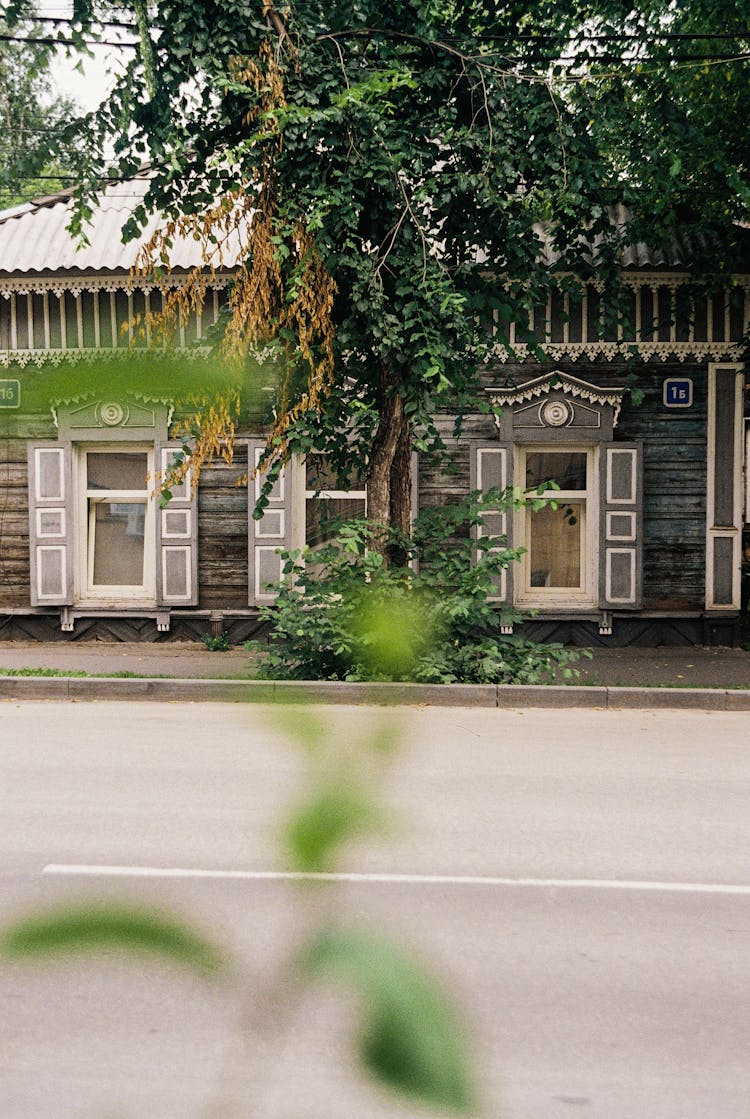 Traditional House By Empty Street