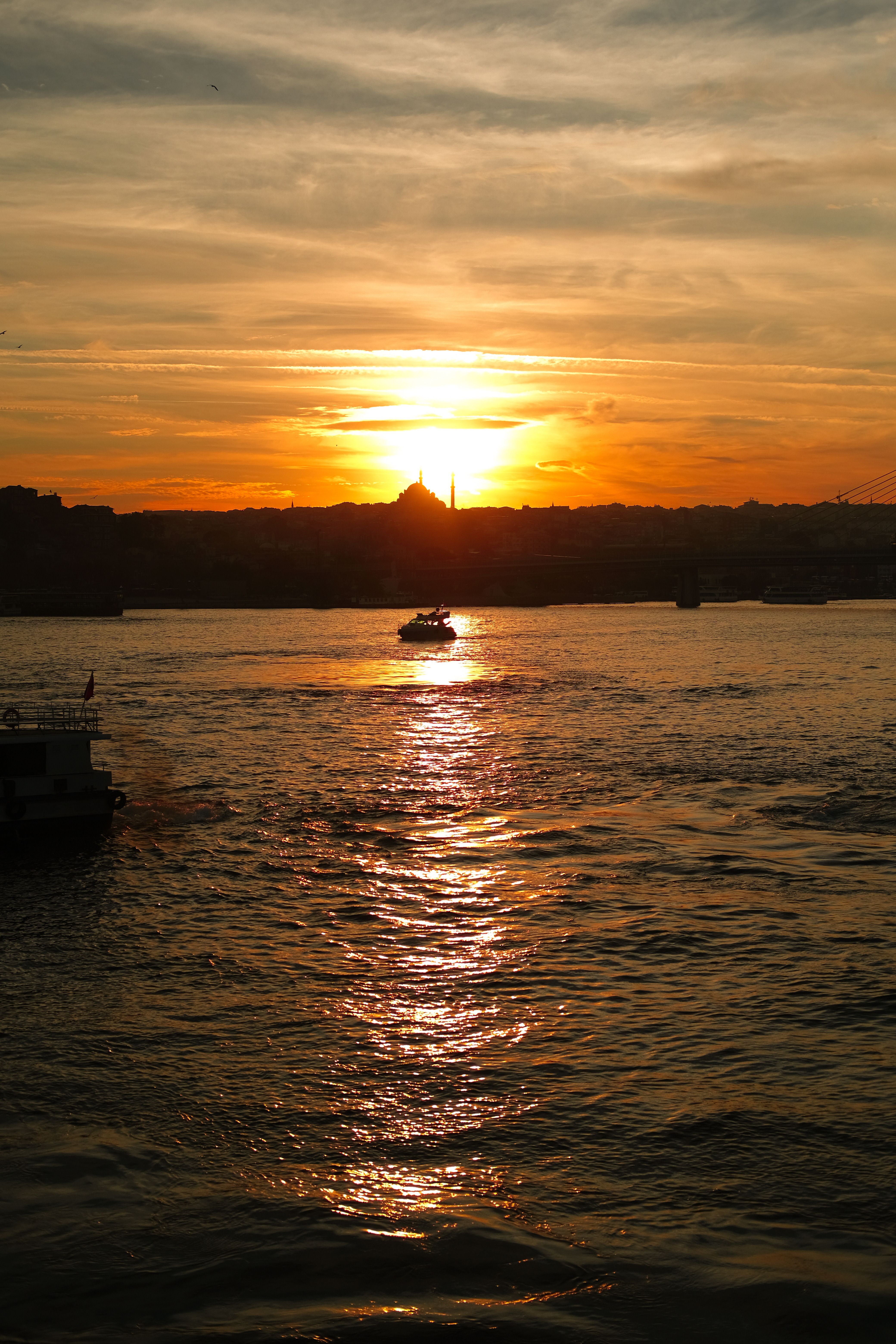 Silhouette of Boat on Sea during Sunset · Free Stock Photo