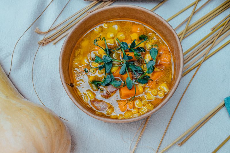 shrimp corn chowder with a scattering of bacon