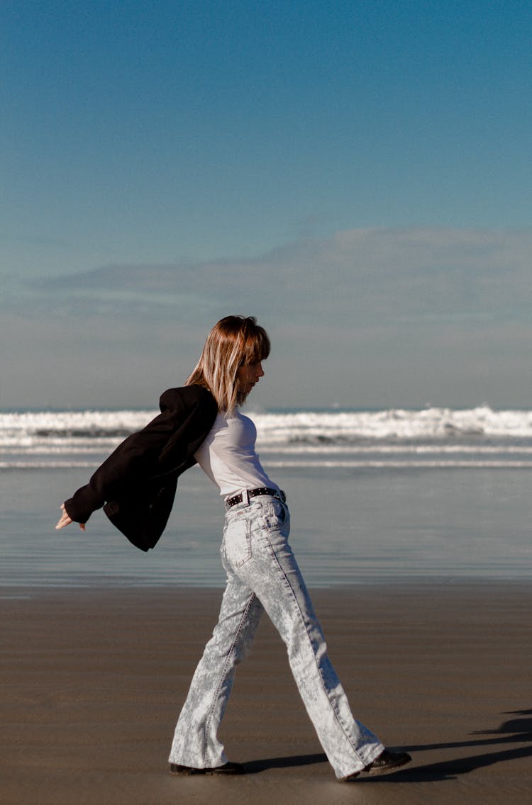 Photo Of A Woman At The Beach