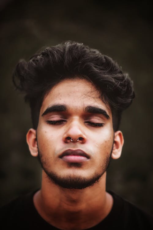 Portrait of a Man with a Nose Piercing