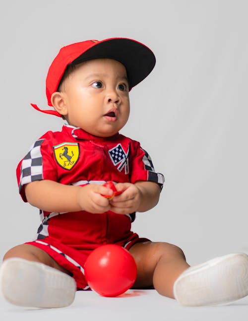 A Boy Wearing Red Cap