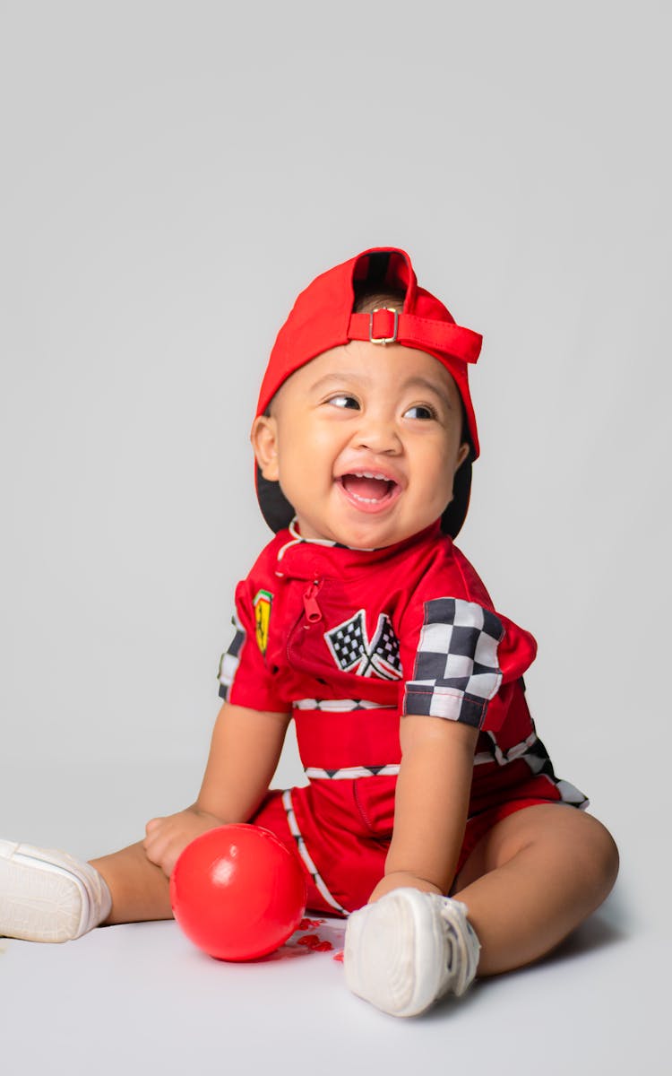 A Toddler In Racer Outfit