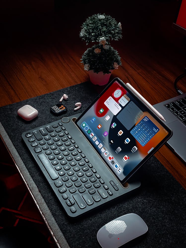 Gadgets On Wooden Desk