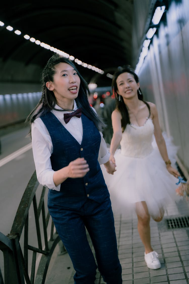 Women Walking In Shirt With Vest And Dress