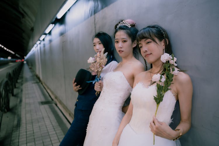 Women In Dresses In Tunnel