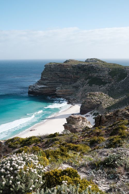 Free Breathtaking landscape of Diaz Beach with rocky cliffs and blue ocean waves. Stock Photo