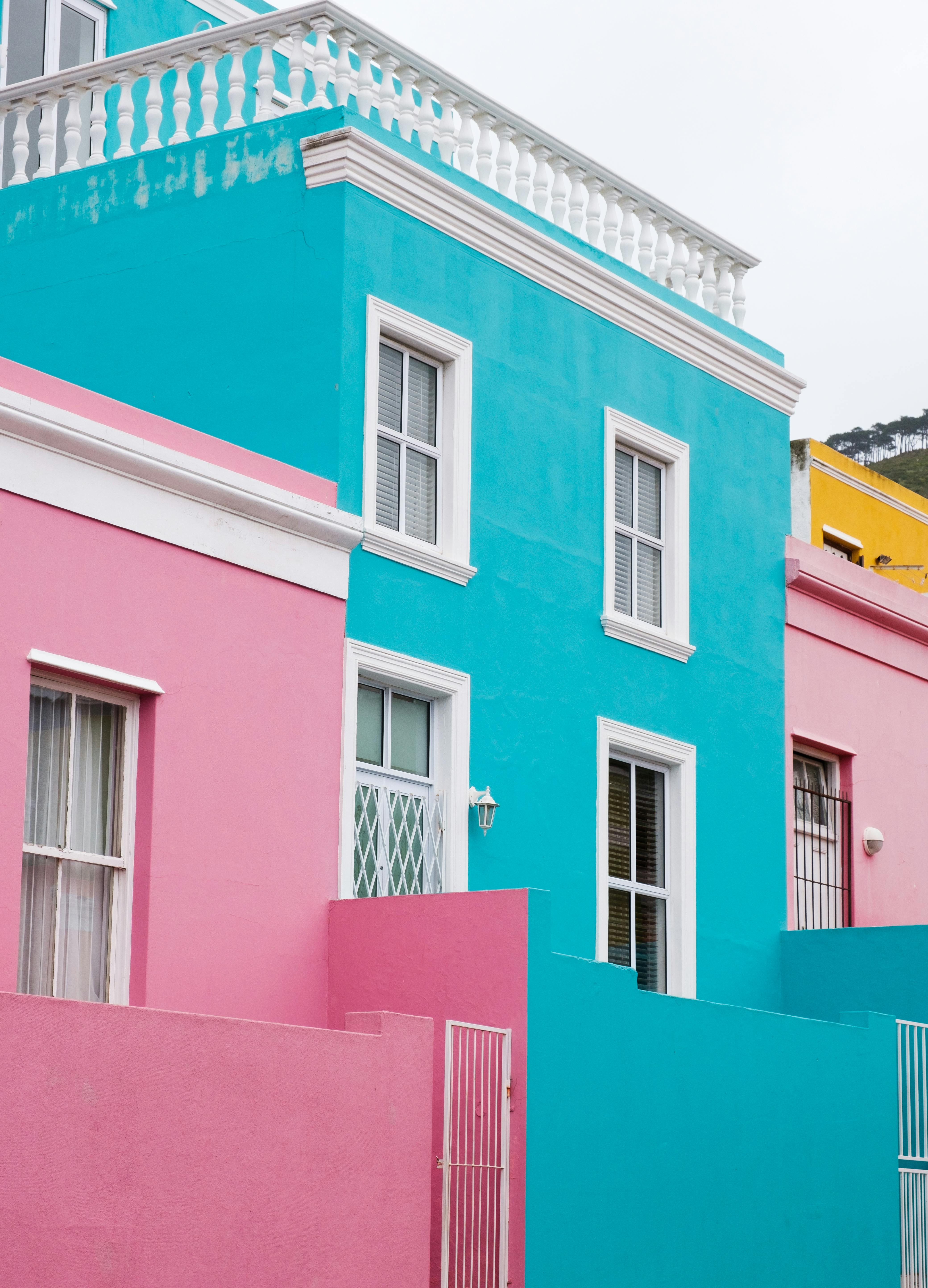 facades of pink and blue houses in bo kaap in cape town south africa