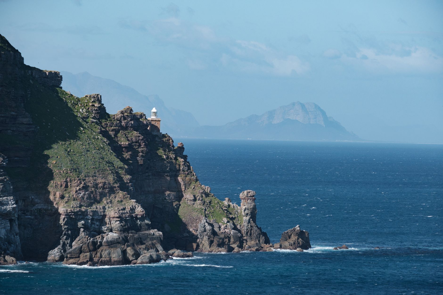 cape point south africa peninsula lighthouse rocky cliffs atlantic ocean blue