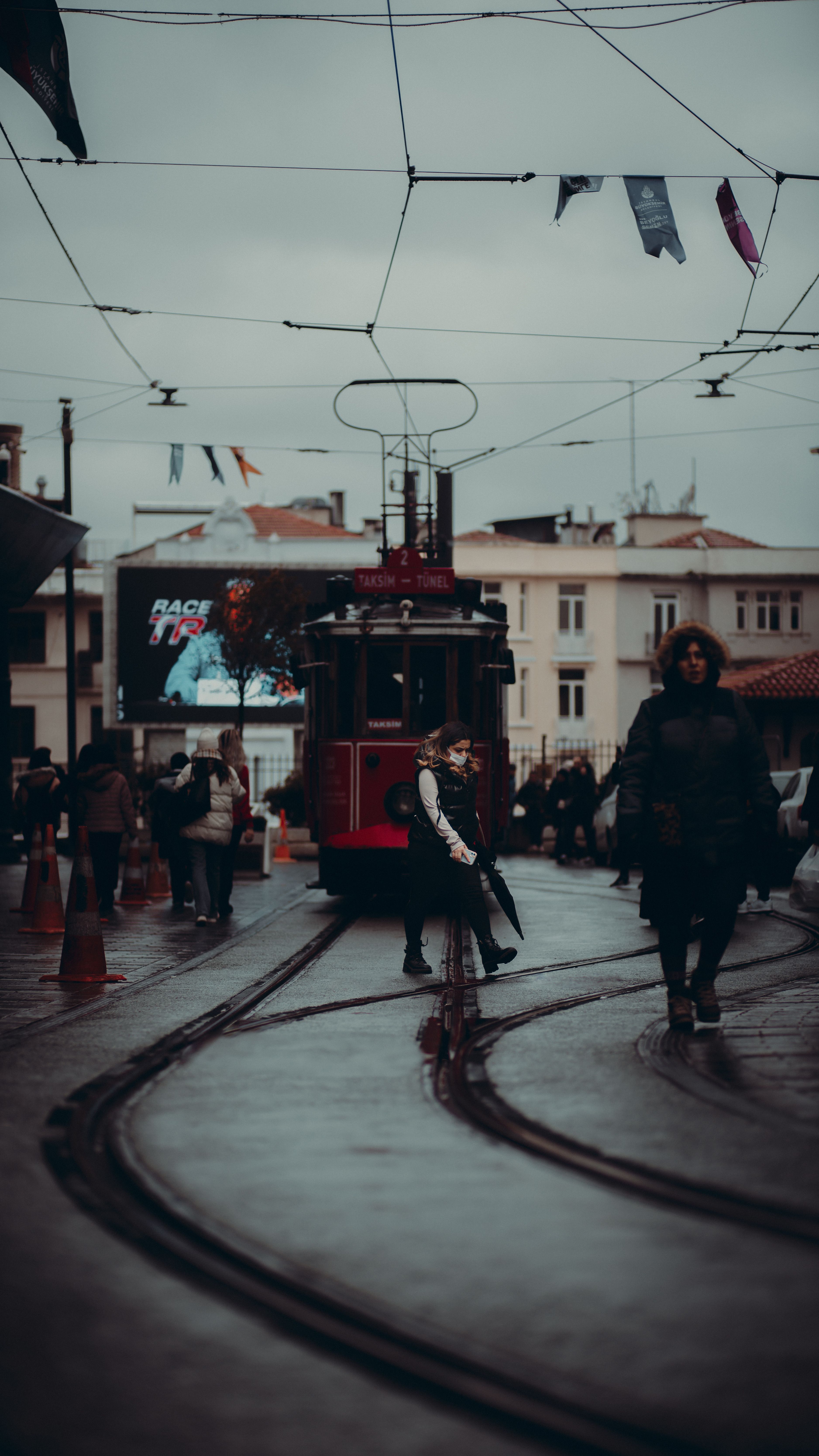 People Walking Beside a Tram · Free Stock Photo