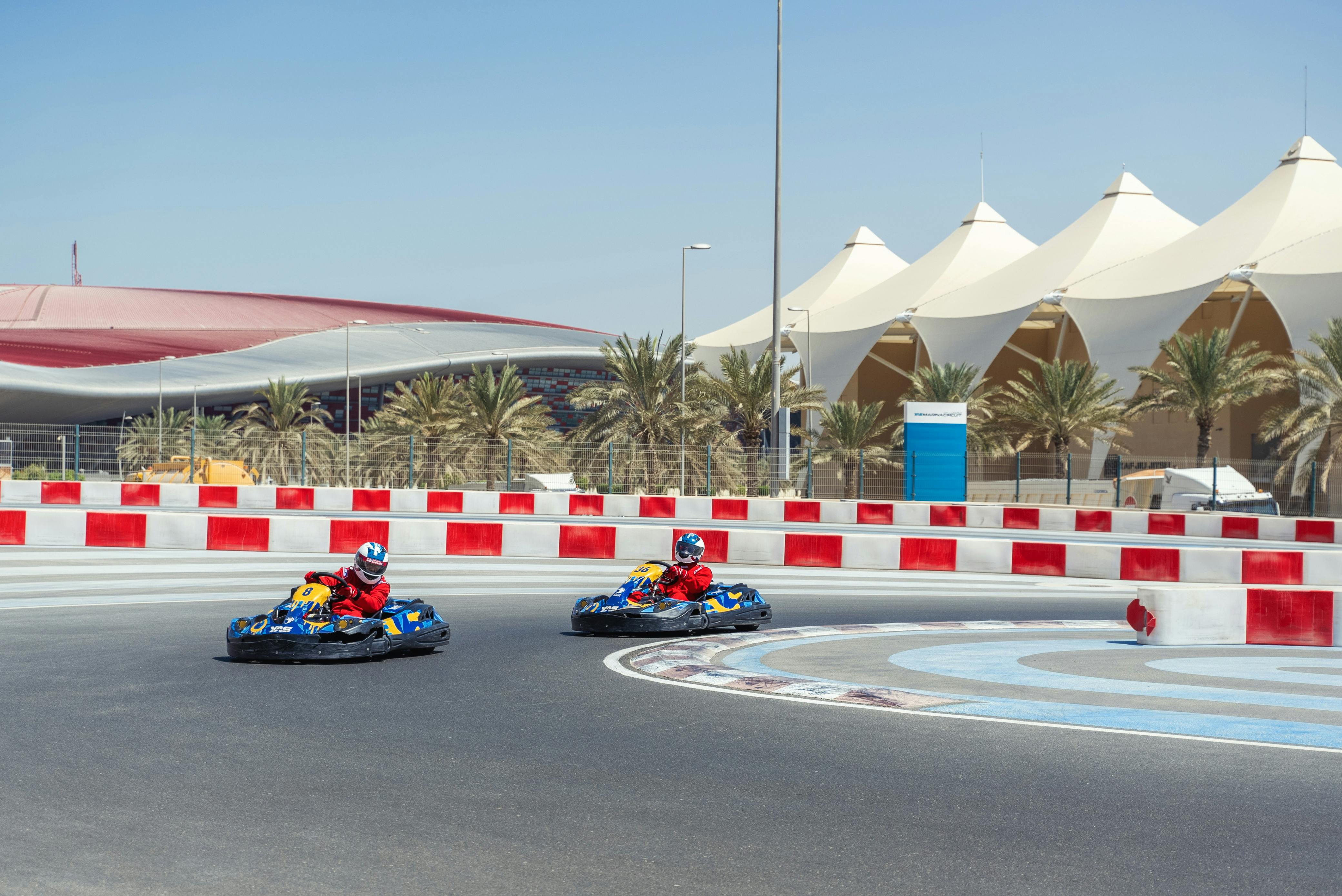 Go-kart racers speed around the track at Yas Marina Circuit, Abu Dhabi.