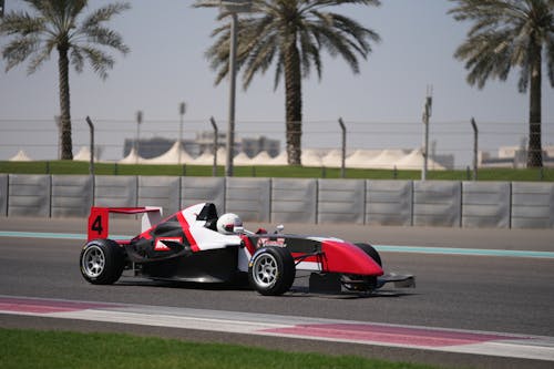 Free A Red and White F1 Racing Car Stock Photo