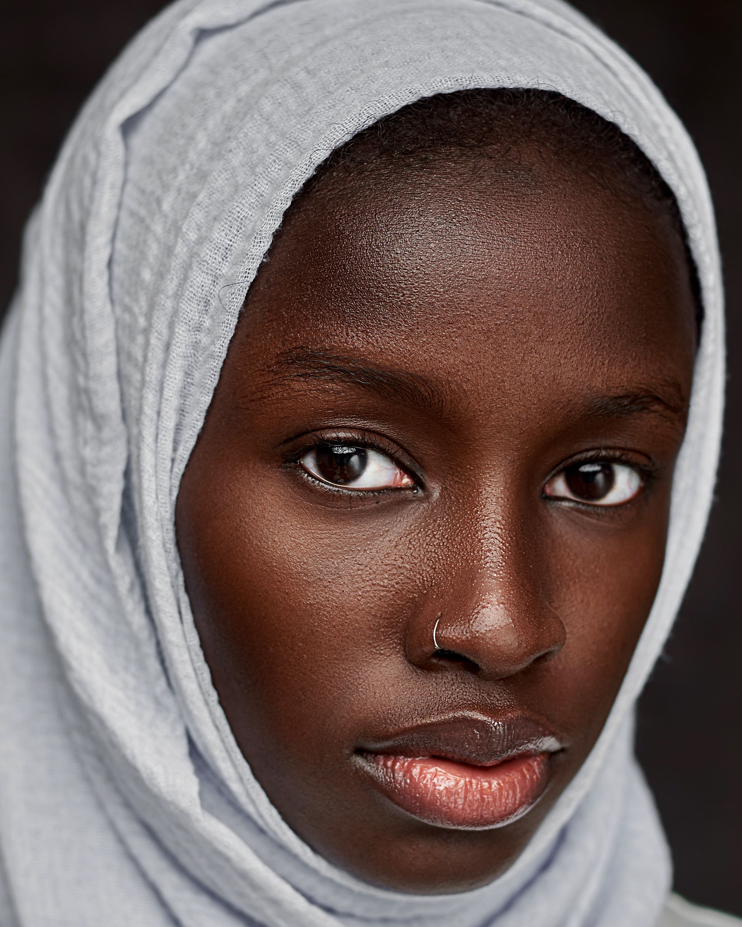 Close-Up Photo of a Young Woman Posing in White Long Sleeve Shirt and ...