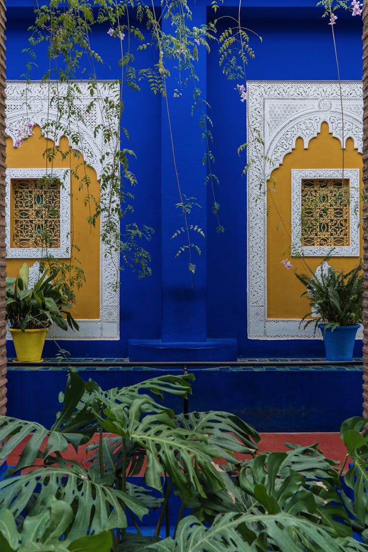 Wooden Windows On A Blue Wall