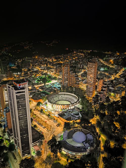 Free A captivating aerial photograph showcasing Bogota's illuminated night cityscape with iconic landmarks. Stock Photo