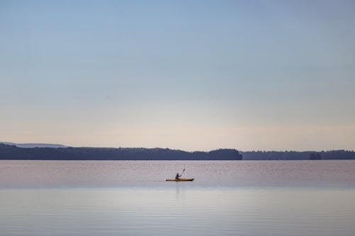 Photos gratuites de aube, détente, faire du kayak