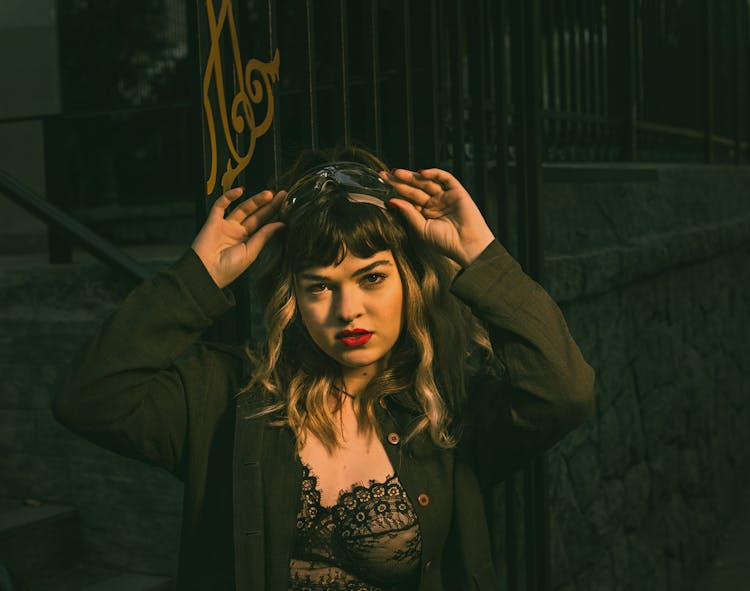 Young Fashionable Woman With Red Lips