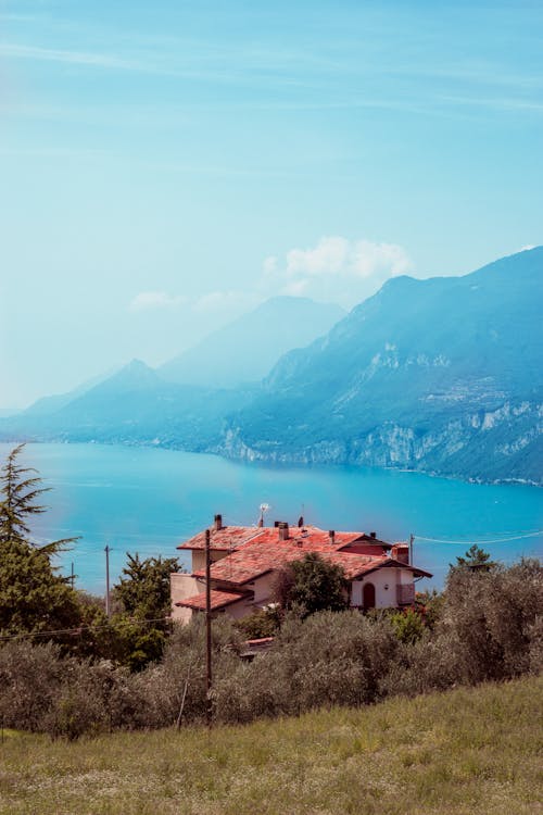 White House Near Sea and Mountains