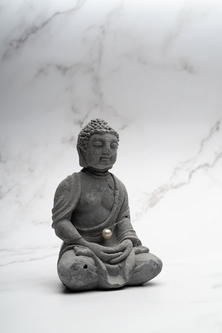 Stone Buddha On White Marble