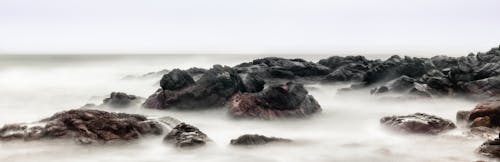 Black Rock With Fog