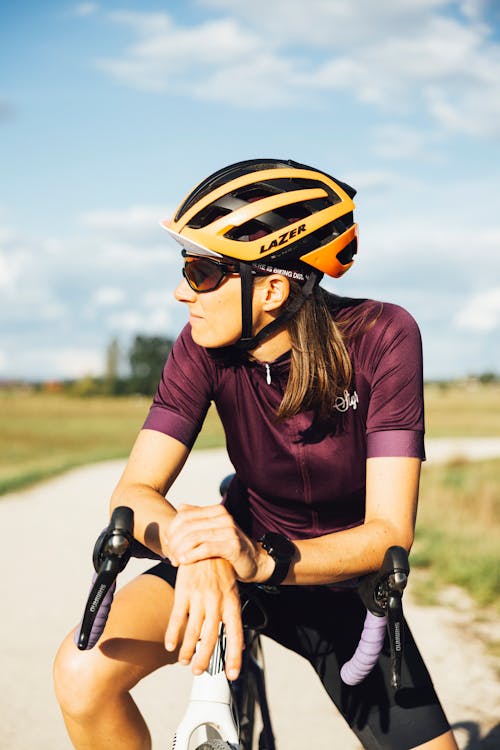 A Man Wearing a Bicycle Helmet