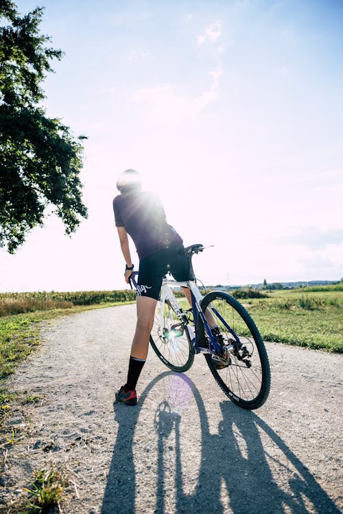 Foto profissional grátis de bicicleta de estrada, cavaleiro, céu