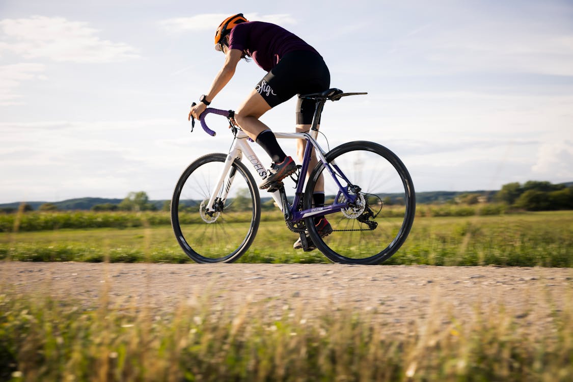 Základová fotografie zdarma na téma cyklista, jezdec, jízdní kolo