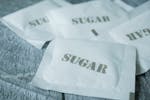 Close-up of Small Packets of Sugar 