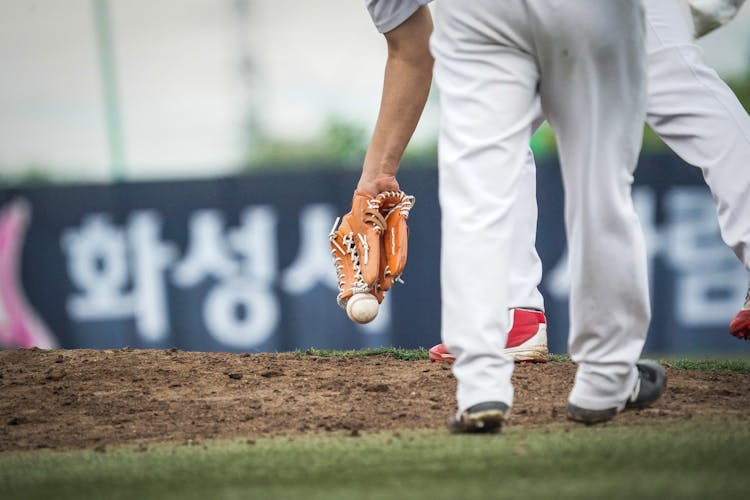 Baseball Player Catching A Ball