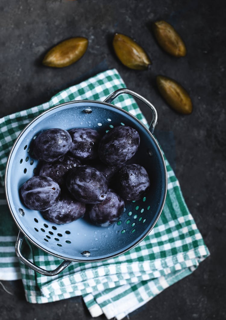 Plums In A Colander 