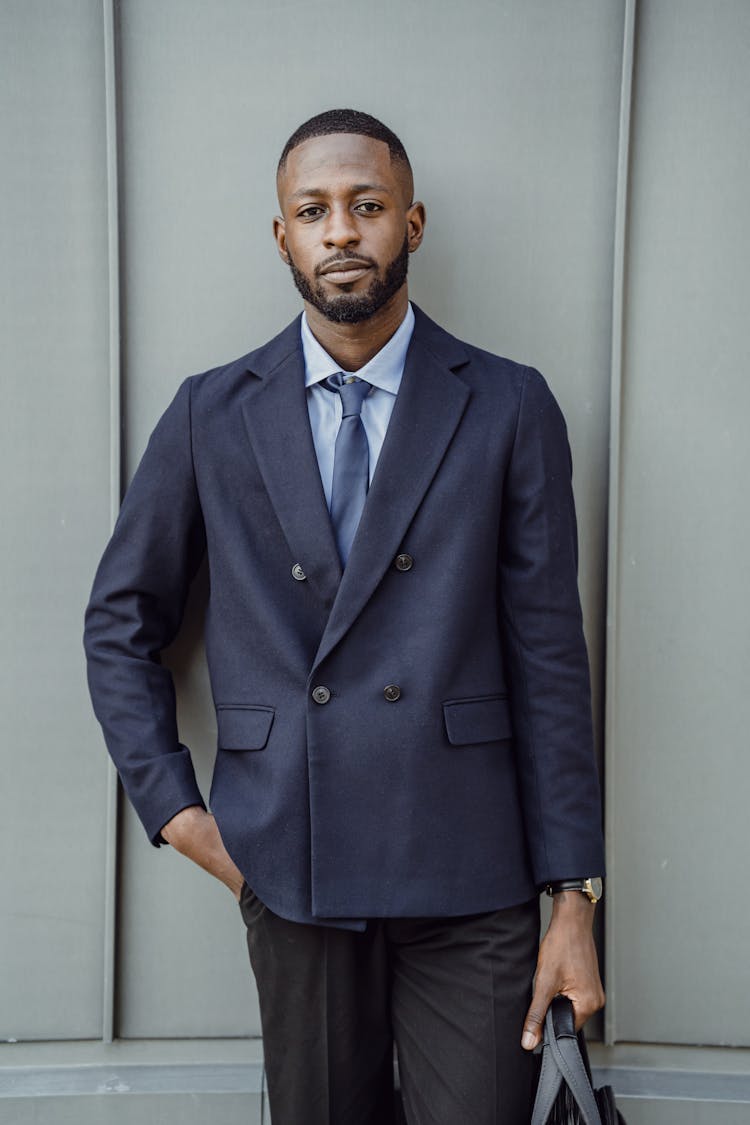 Businessman In Suit Posing Outdoors