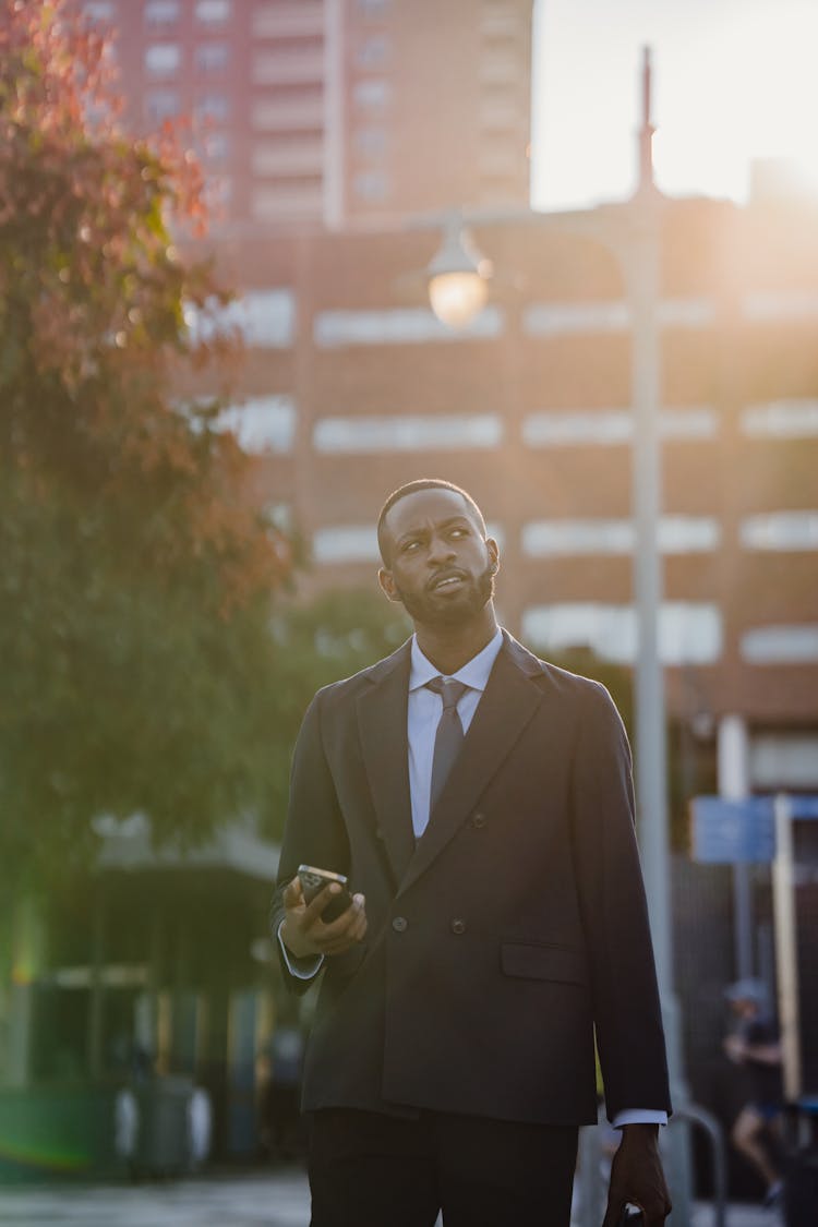 Businessman In Suit On City Street