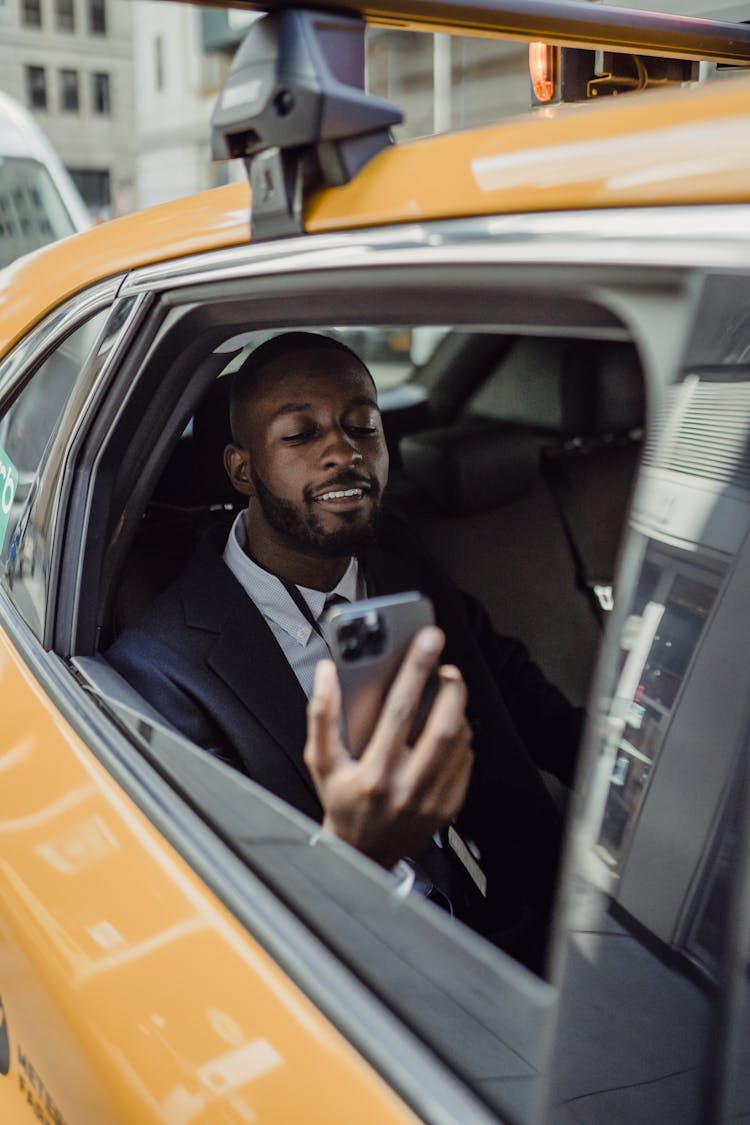 Man Looking At His Phone 