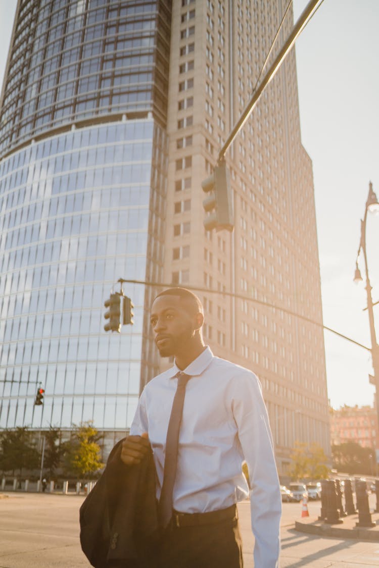 Man In Shirt In City