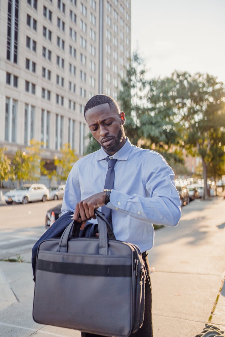 Man Looking At Watch