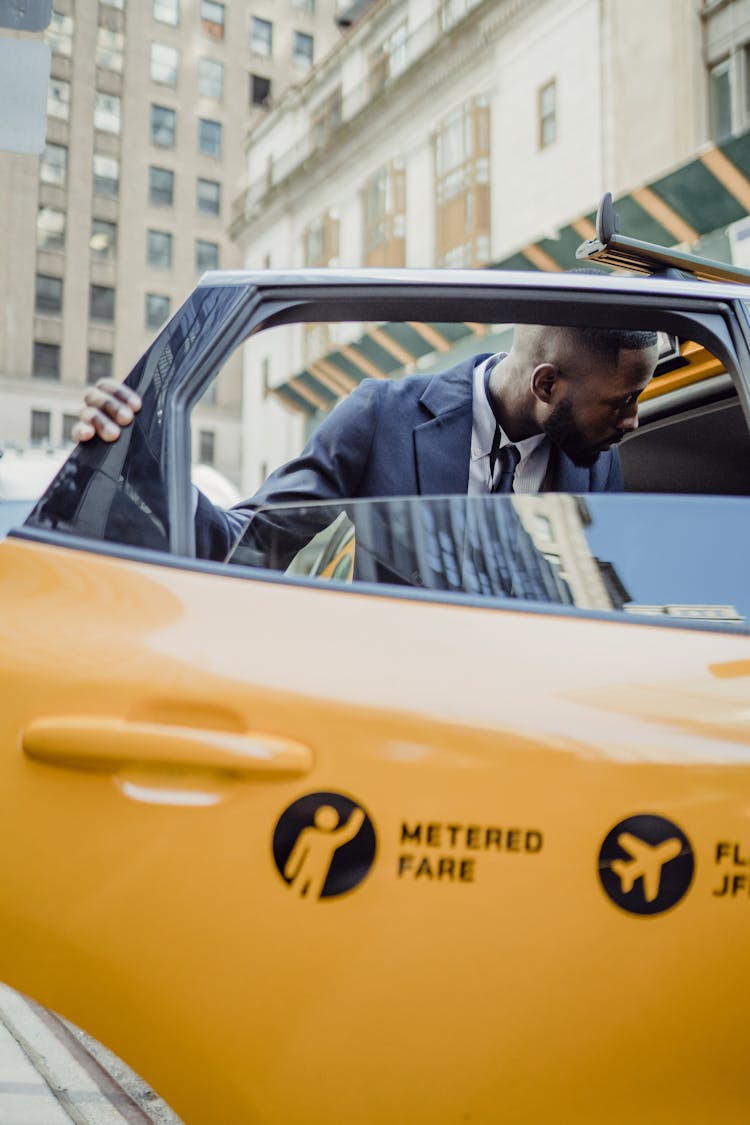 Man Behind Taxi Door