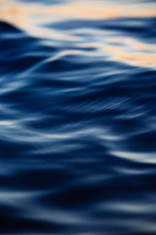 altın saat, dalgalar, dikey atış içeren Ücretsiz stok fotoğraf