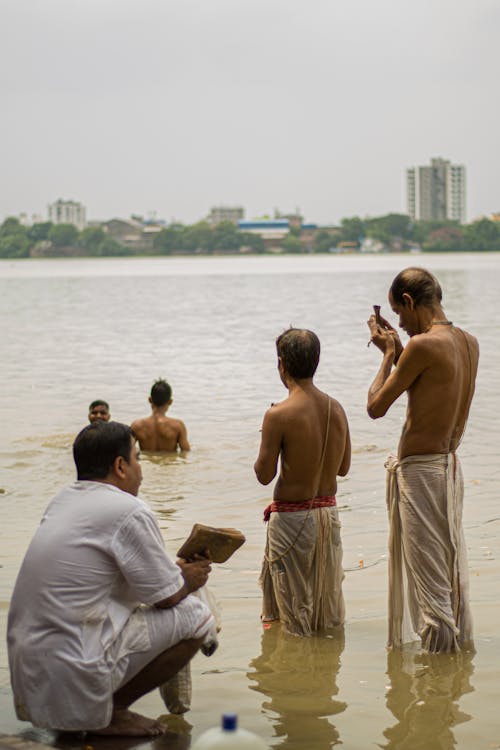 Man in a River Praying