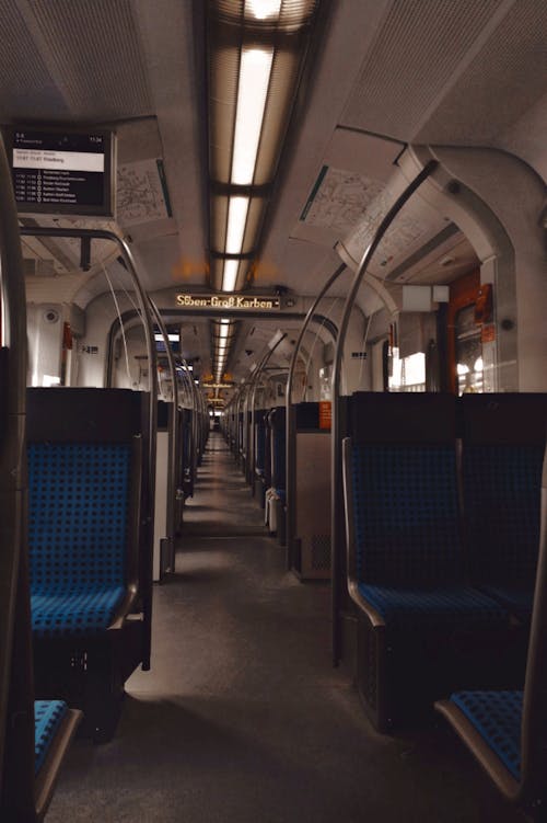 Blue and Gray Empty Train Seats