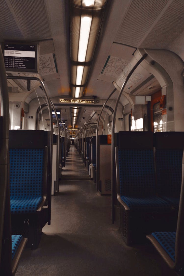 Blue And Gray Empty Train Seats