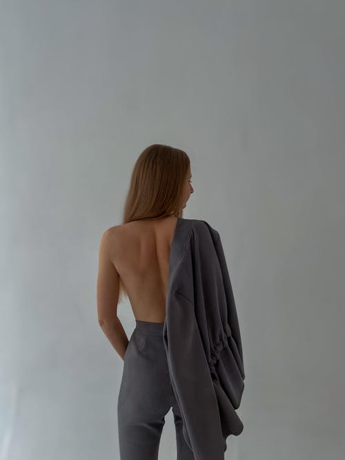 Back View of a Shirtless Woman