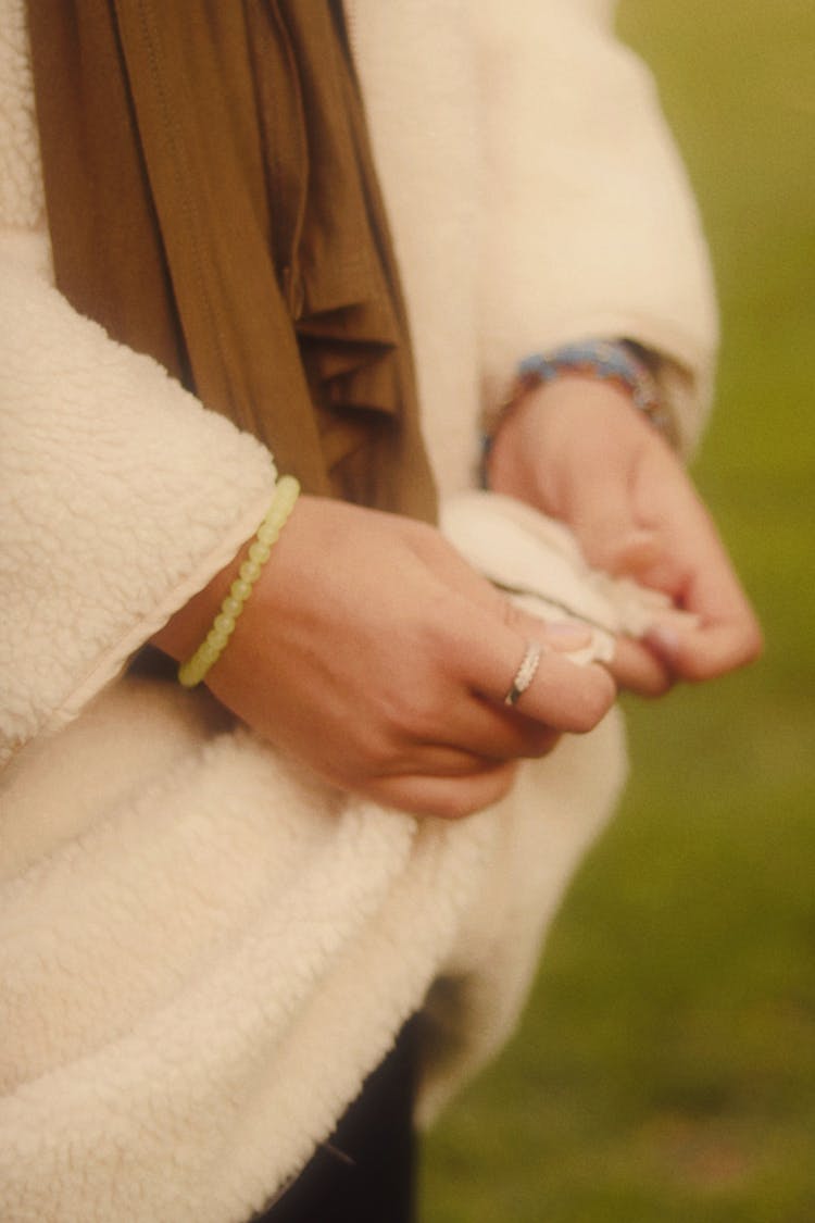 Woman Holding Zip Fastener